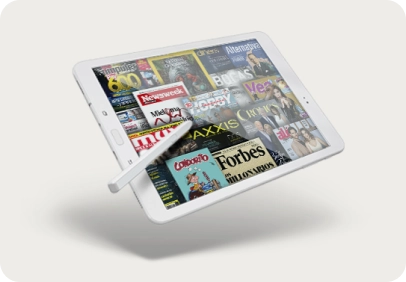 Tablet com caneta com uma imagem a qual é uma colagem com várias capas de revista